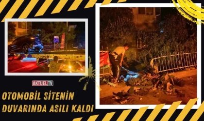 Otomobil Sitenin Duvarında Asılı Kaldı